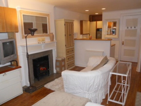 Living Room w Decorative Fire Place & Flat Screen TV